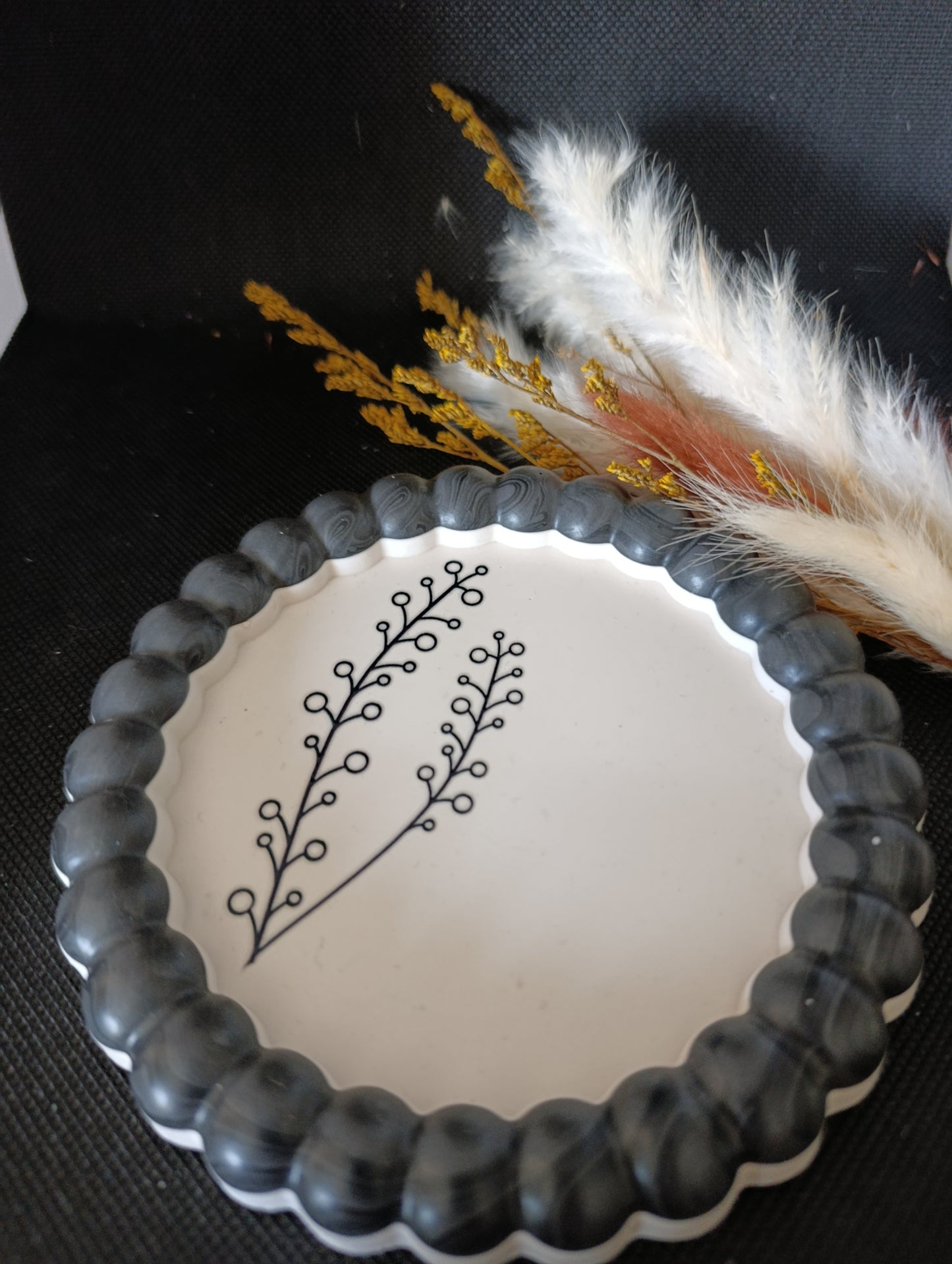 Vide poche rond noir et blanc